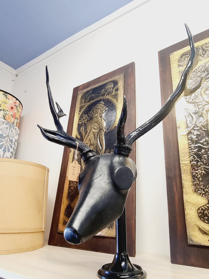 Fallow deer with black leather - decorative black stand